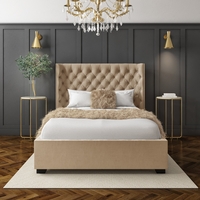 Milania King Size Ottoman Bed in Light Beige Velvet with Curved Headboard