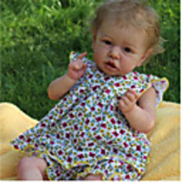 22 inch Reborn Doll Baby Toddler Toy Baby Girl Reborn Baby Doll Saskia lifelike Hand Made Simulation Hand Applied Eyelashes Floppy Head Cloth Silicone Vinyl with Clothes and Accessories for Girls
